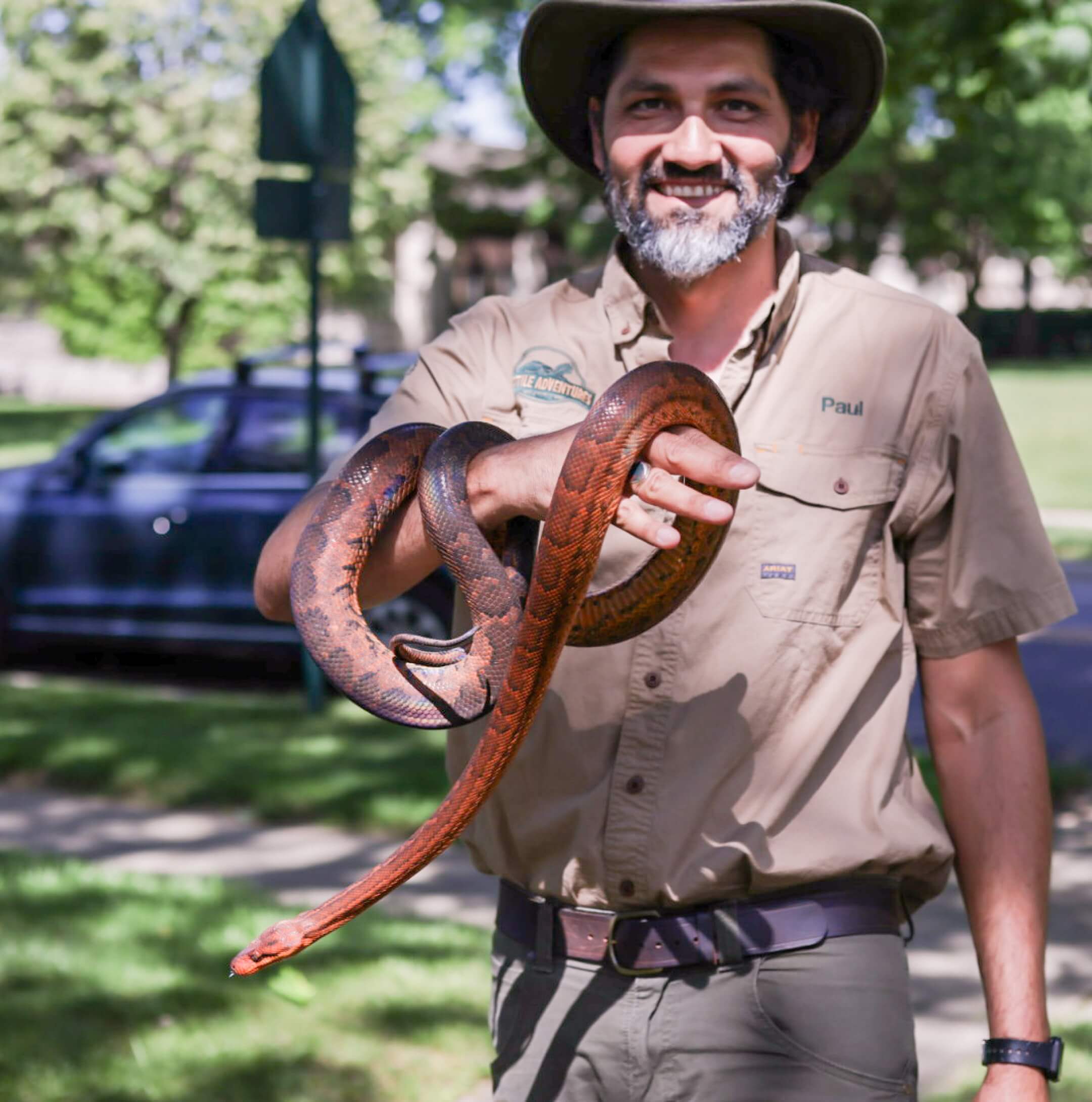 Paul Hernandez with a snake